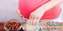 أهمية تناول المكسرات في بداية الحمل